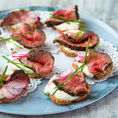 Carpaccio of Beef on Crostini by Anderson Catering